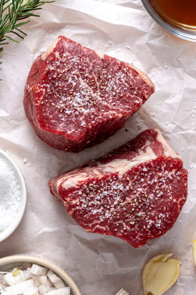 raw filet mignon dried and seasoned