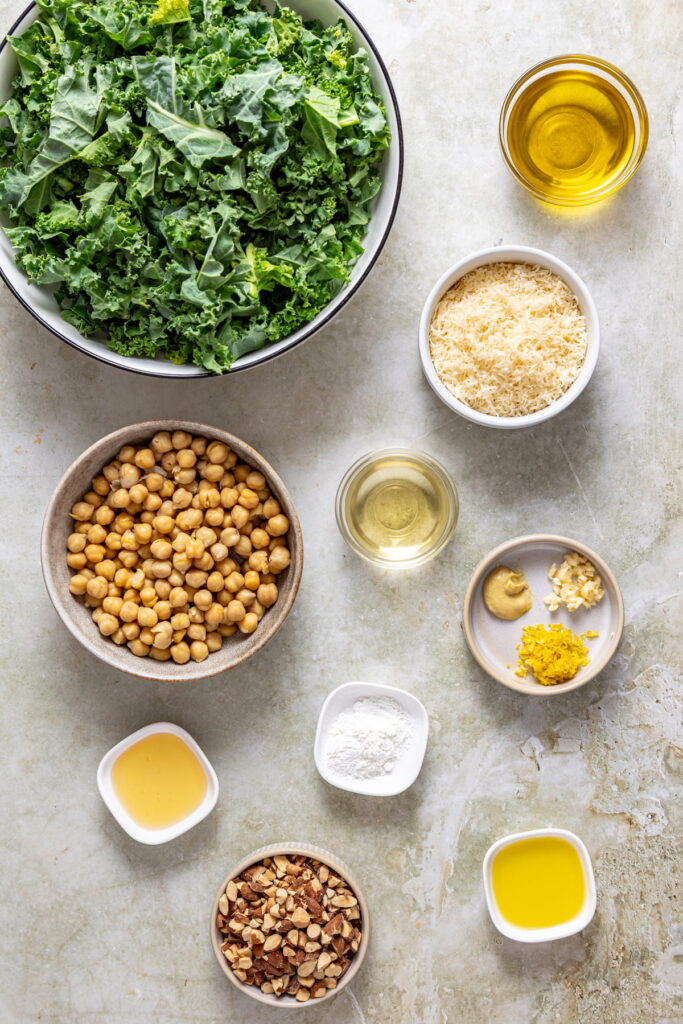 chickpea kale salad ingredients arranged in bowls