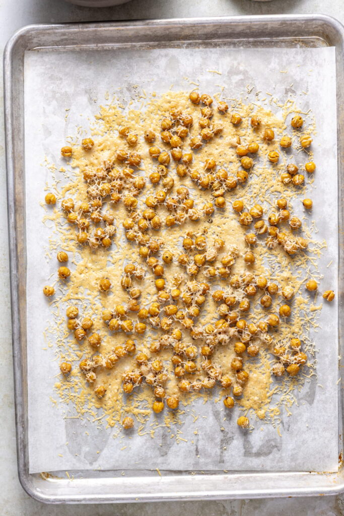 crispy chickpeas with melted parmesan on a sheet pan