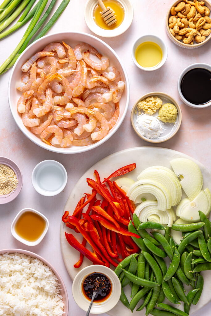 stir fry ingredients arranged on plates and bowls
