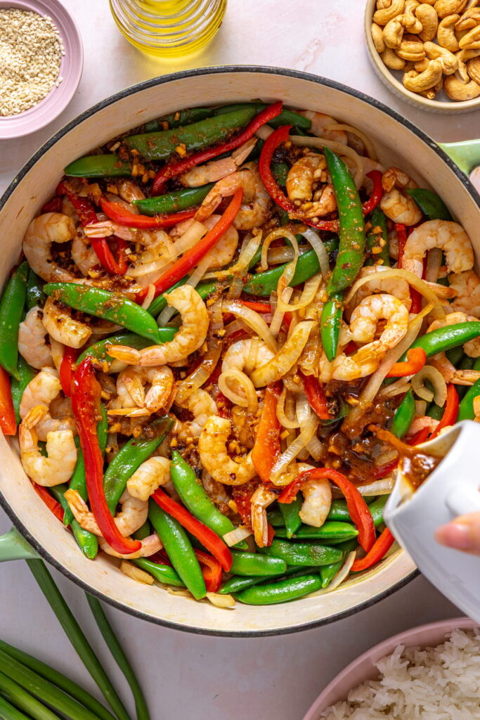 stir fry sauce added to the shrimp and veggies