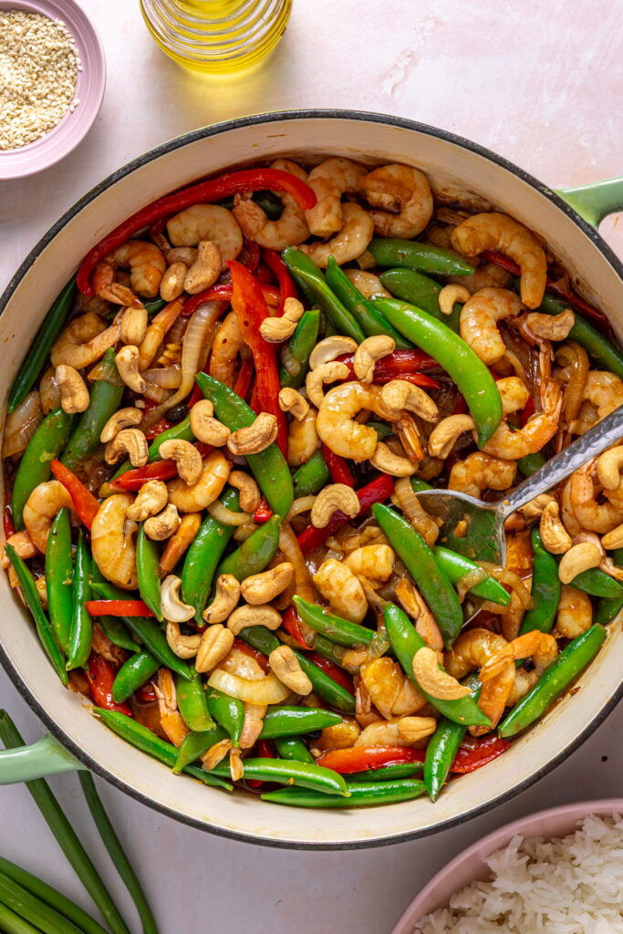 shrimp stir fry topped with cashews