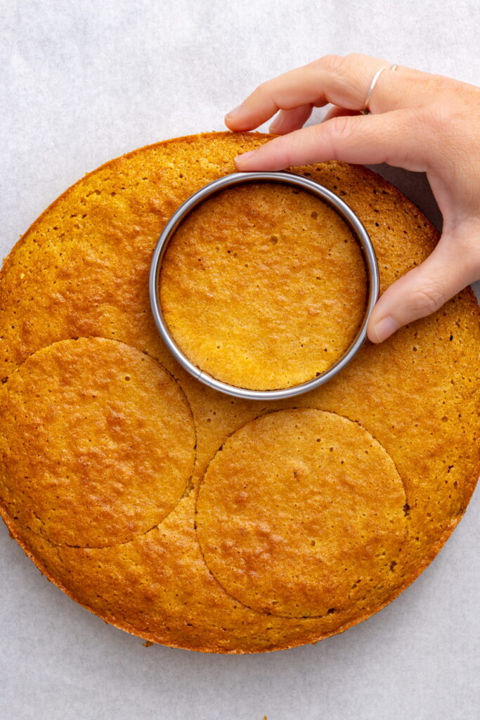 cutting vanilla smash cake